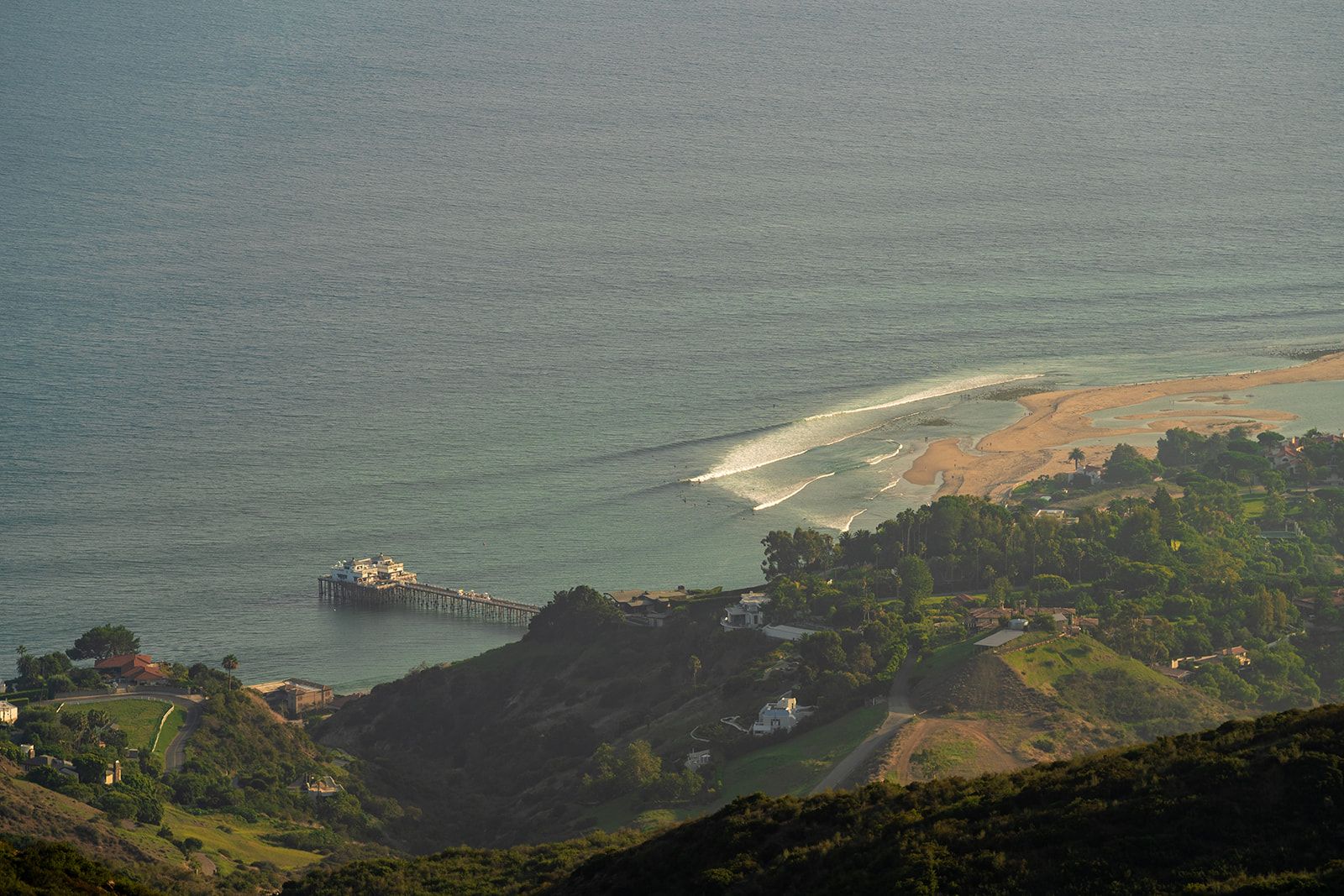 private estate micro wedding in Malibu, A Private Estate Ceremony Under the Copper Arch