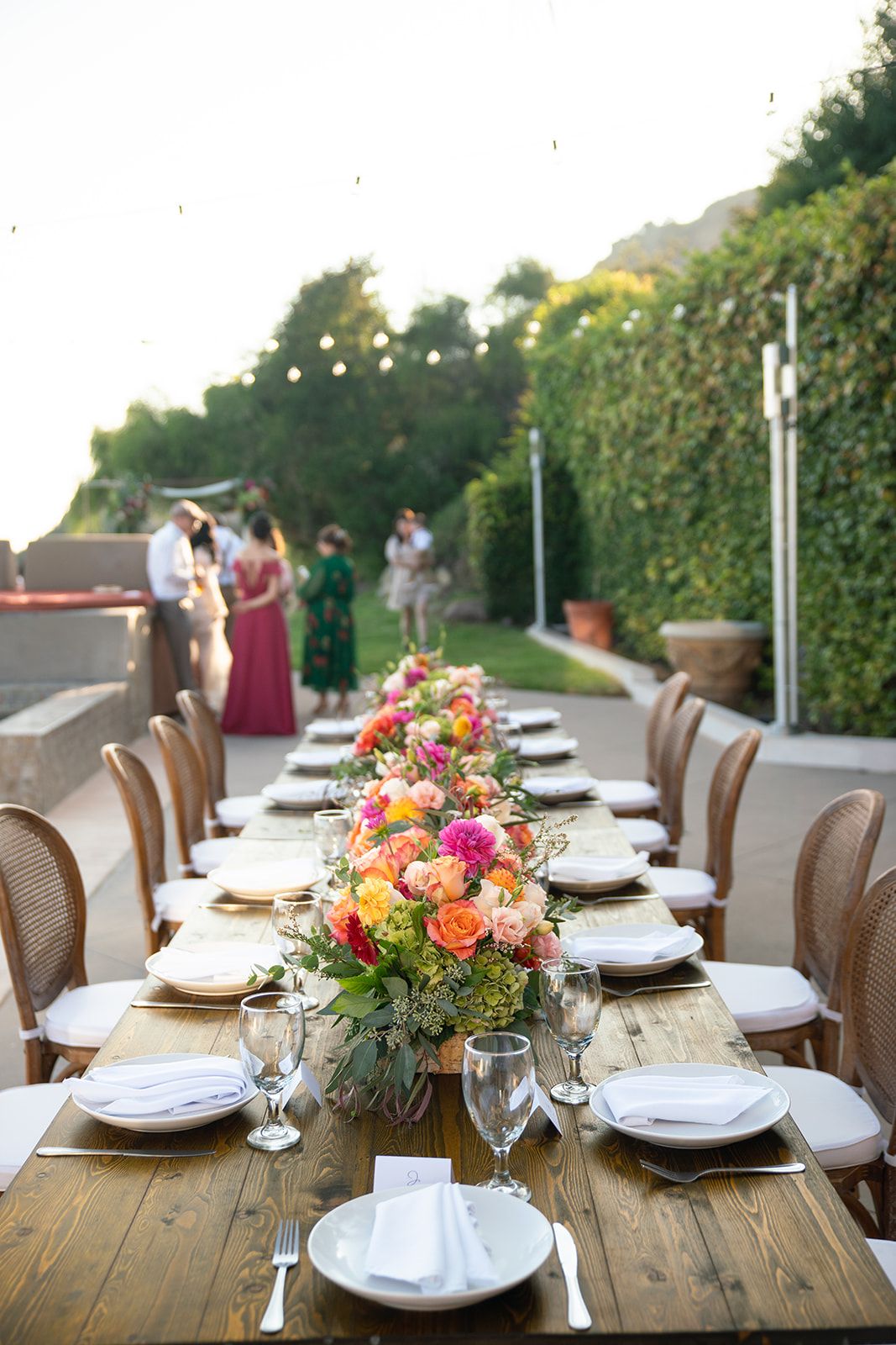 private estate micro wedding in Malibu, Dinner and String Lights by the Pool