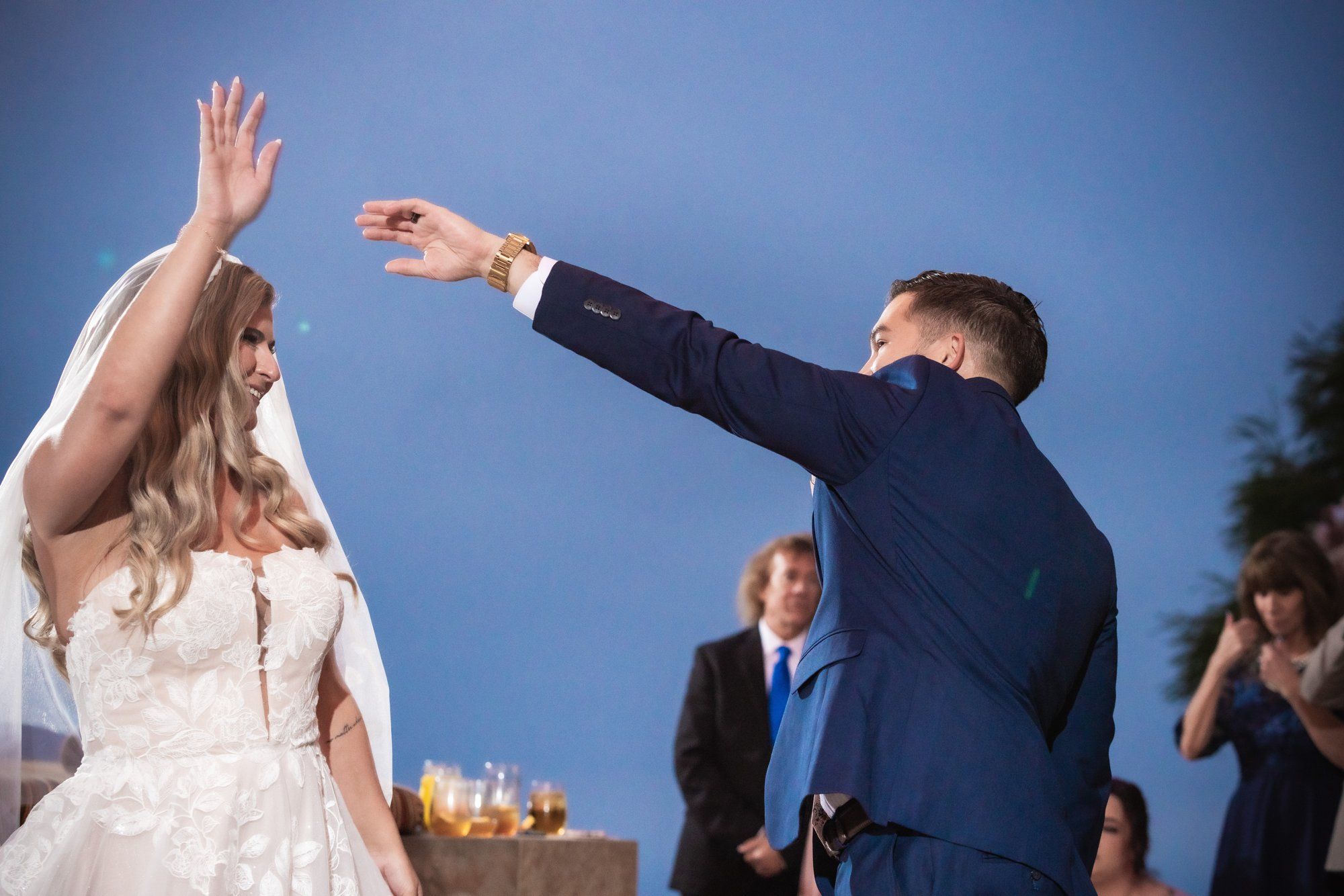private cliffside residence wedding in Malibu, Dinner, Dances, and the Cake by the Pool