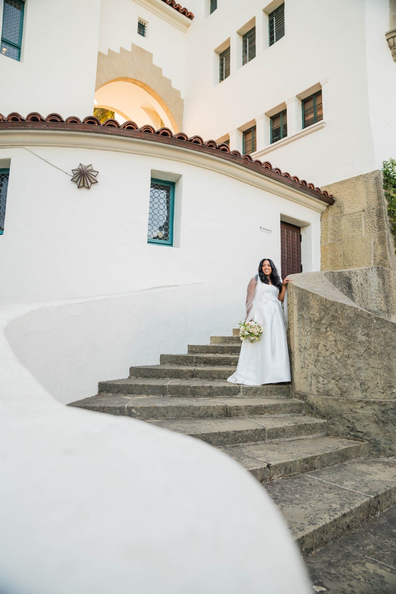 classic santa barbara courthouse micro wedding, Family Photos Under the Classic Santa Barbara Courthouse Arches