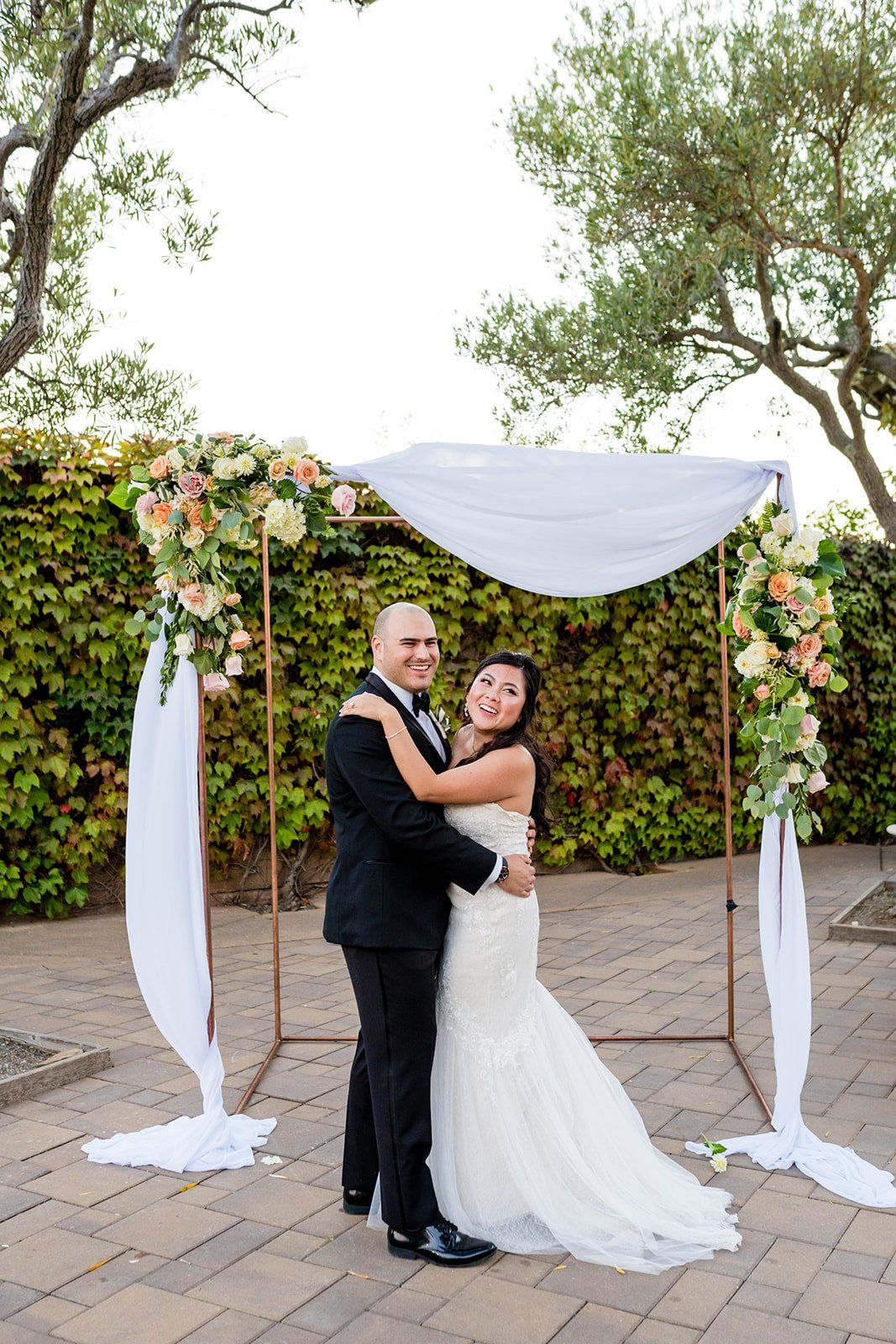 vineyard wedding at viansa in sonoma, The Ceremony in the Viansa Ivy Courtyard