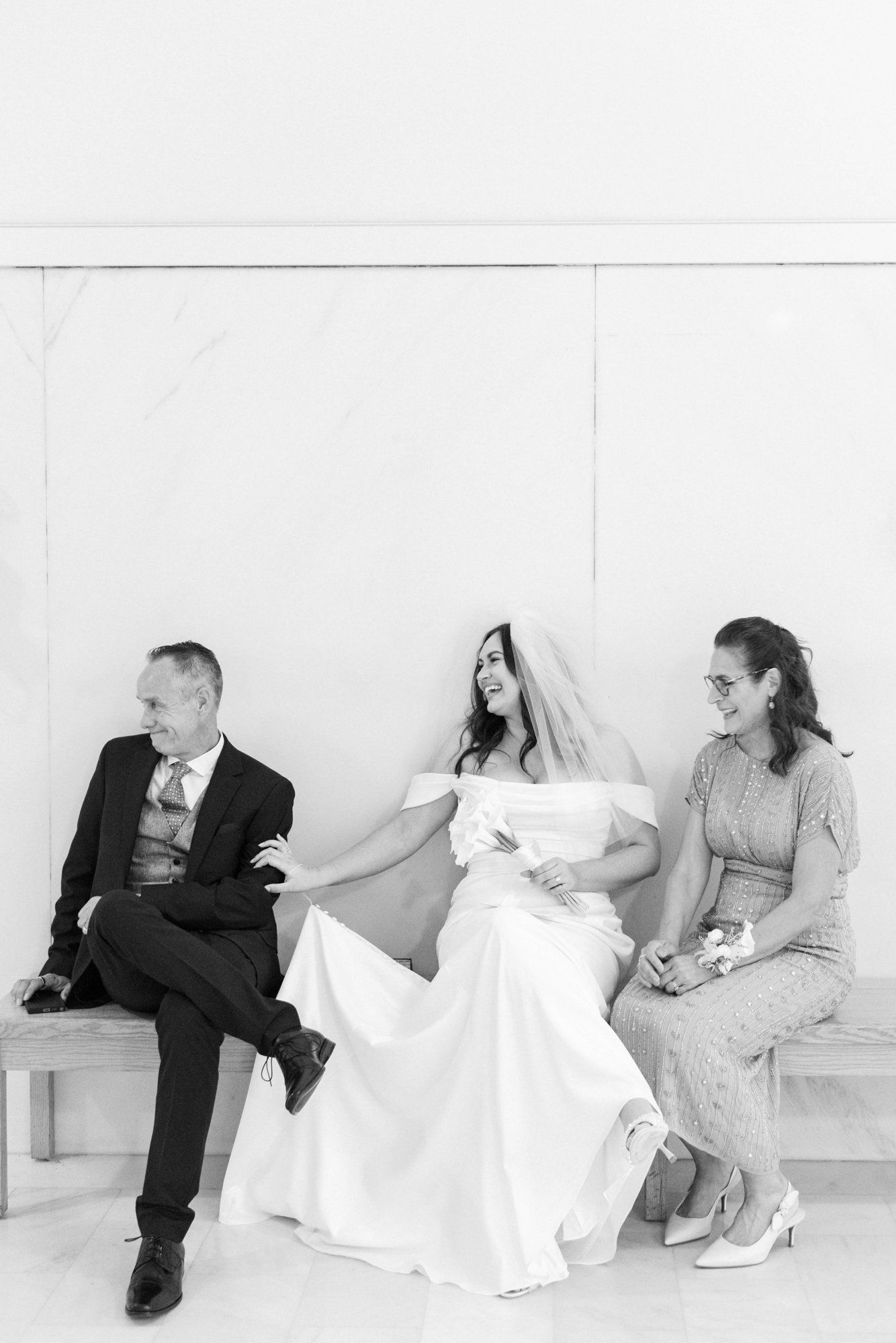 multicultural city hall elopement, Portraits Through the Multicultural City Hall Landmark
