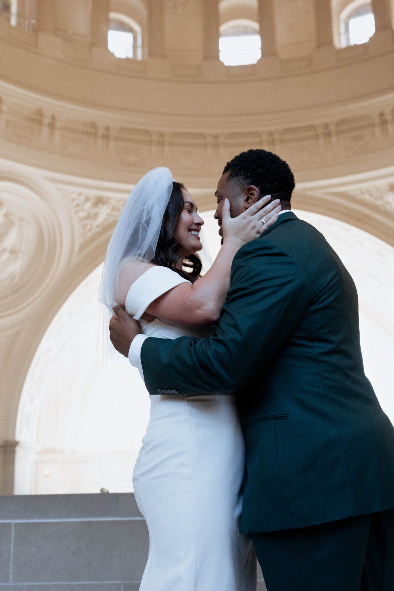 multicultural city hall elopement, Portraits Through the Multicultural City Hall Landmark