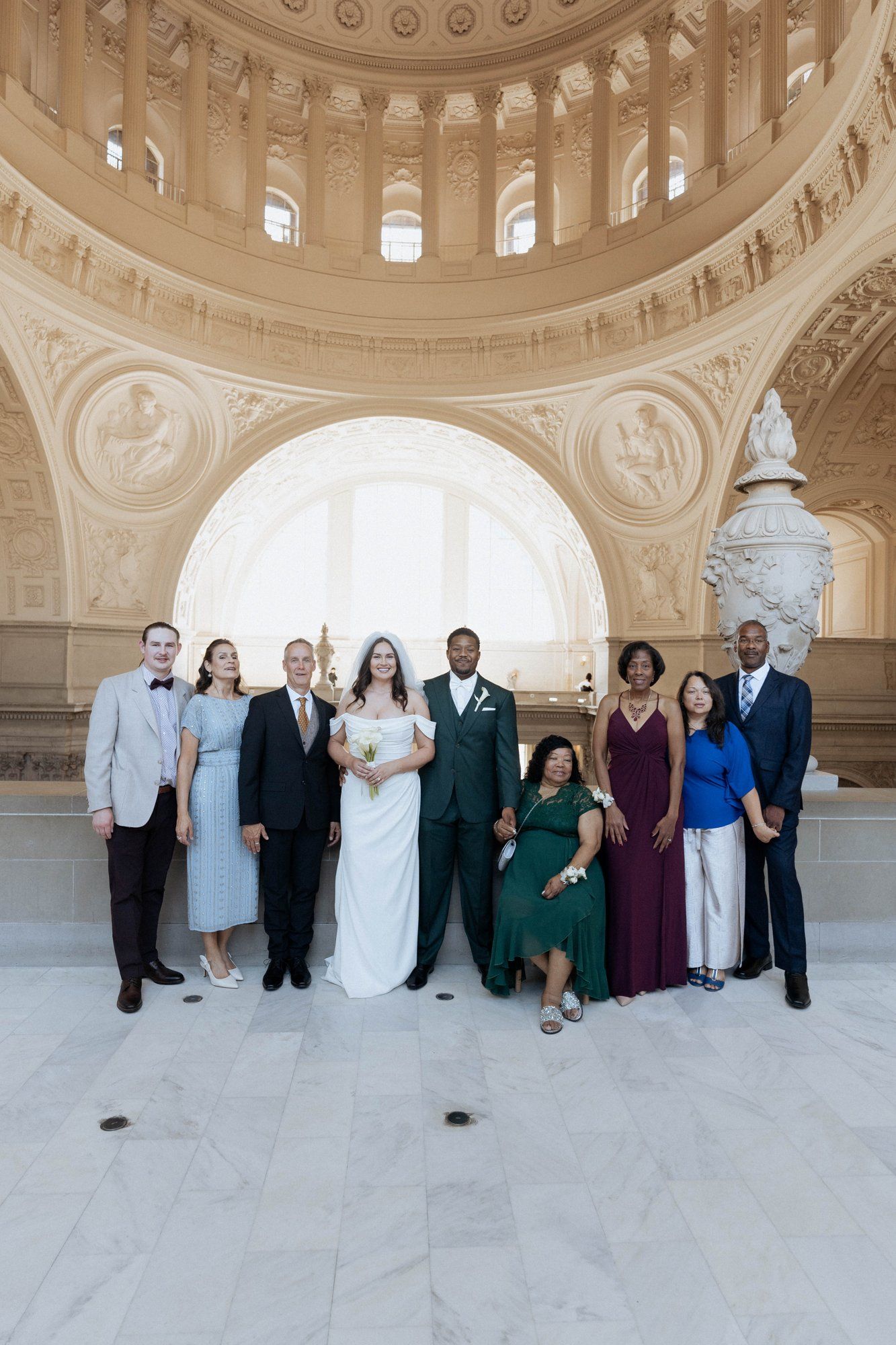 multicultural city hall elopement, Portraits Through the Multicultural City Hall Landmark