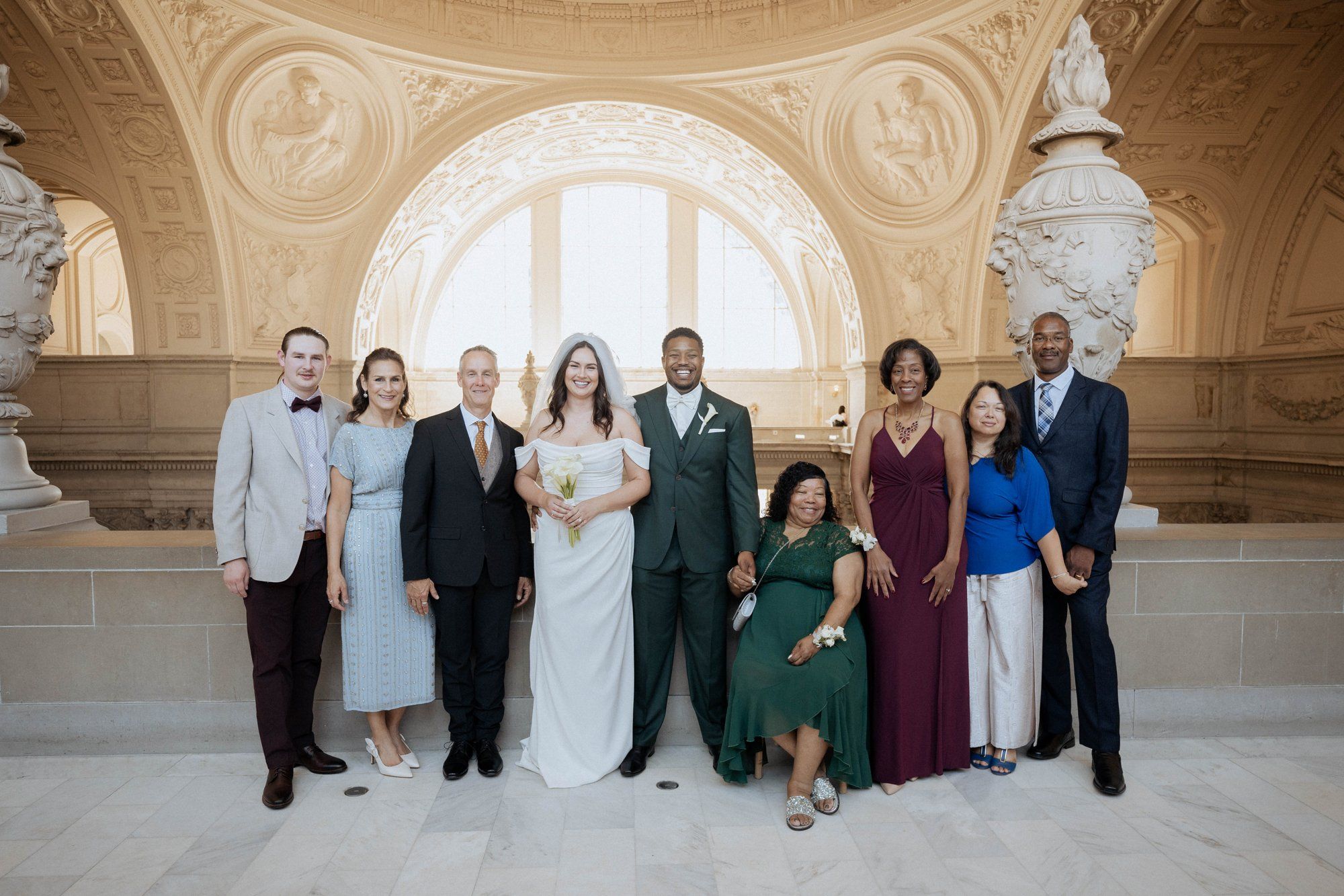 multicultural city hall elopement, Portraits Through the Multicultural City Hall Landmark