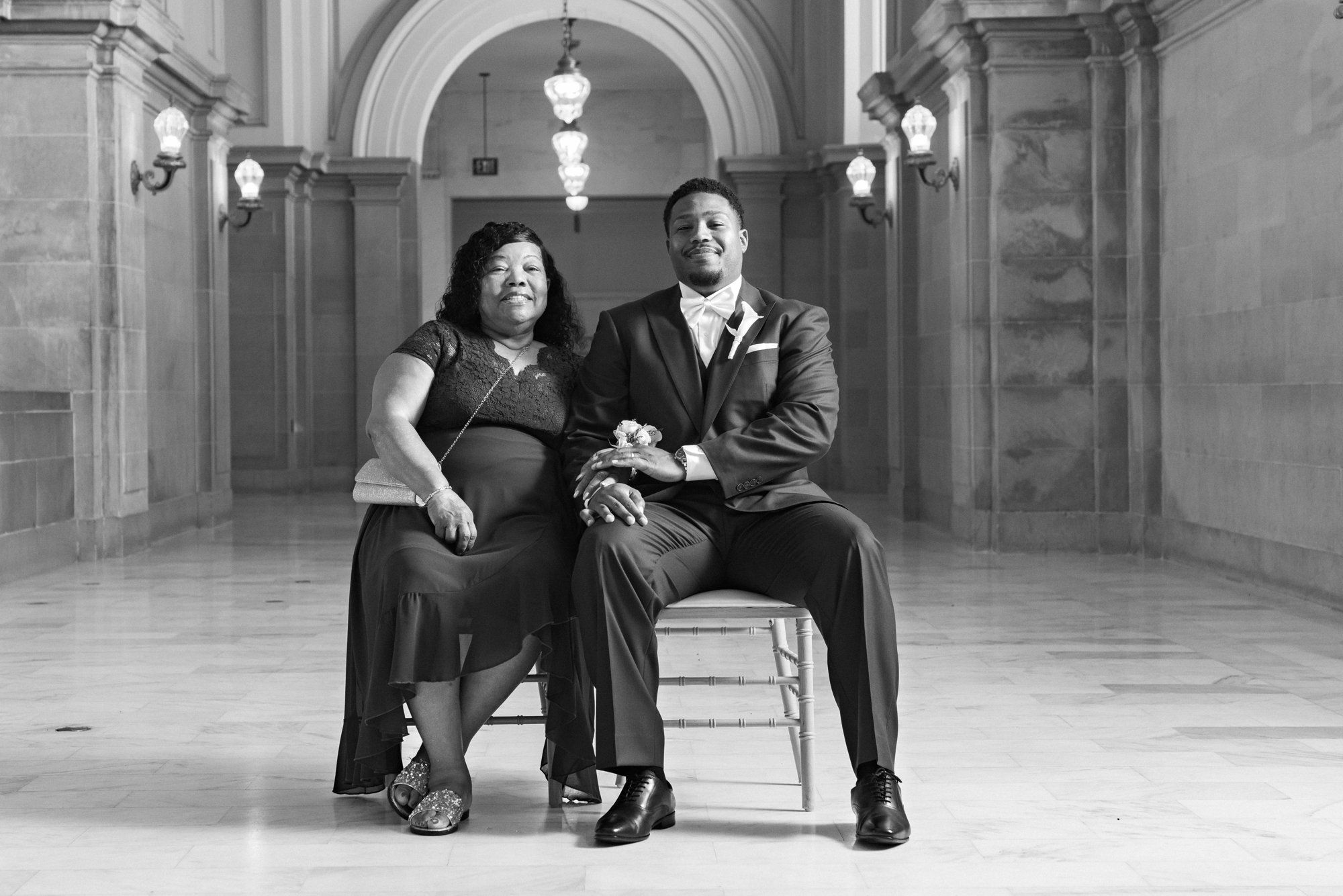 multicultural city hall elopement, Portraits Through the Multicultural City Hall Landmark