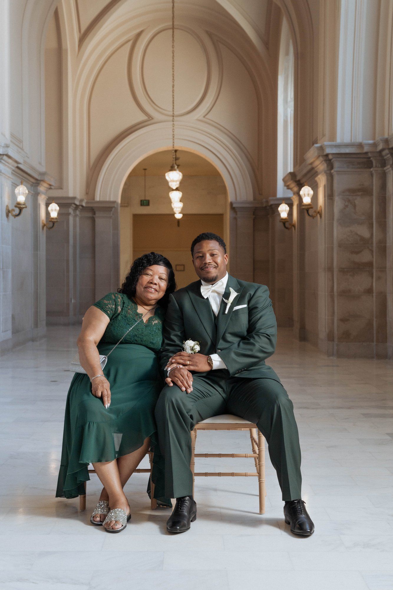 multicultural city hall elopement, Portraits Through the Multicultural City Hall Landmark