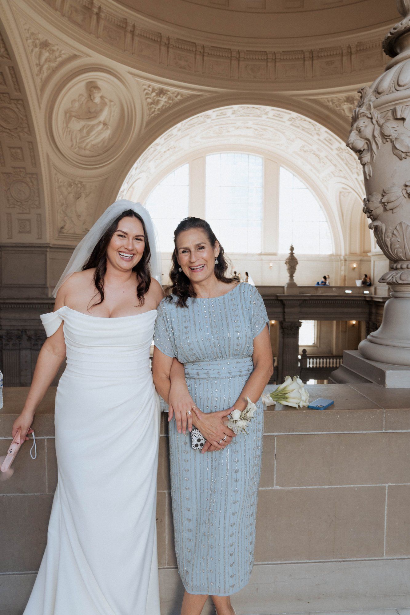 multicultural city hall elopement, Portraits Through the Multicultural City Hall Landmark