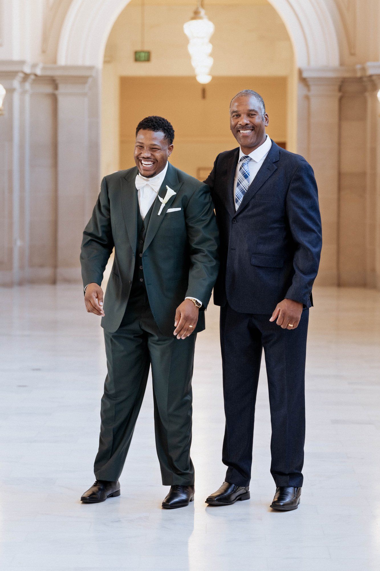 multicultural city hall elopement, Portraits Through the Multicultural City Hall Landmark