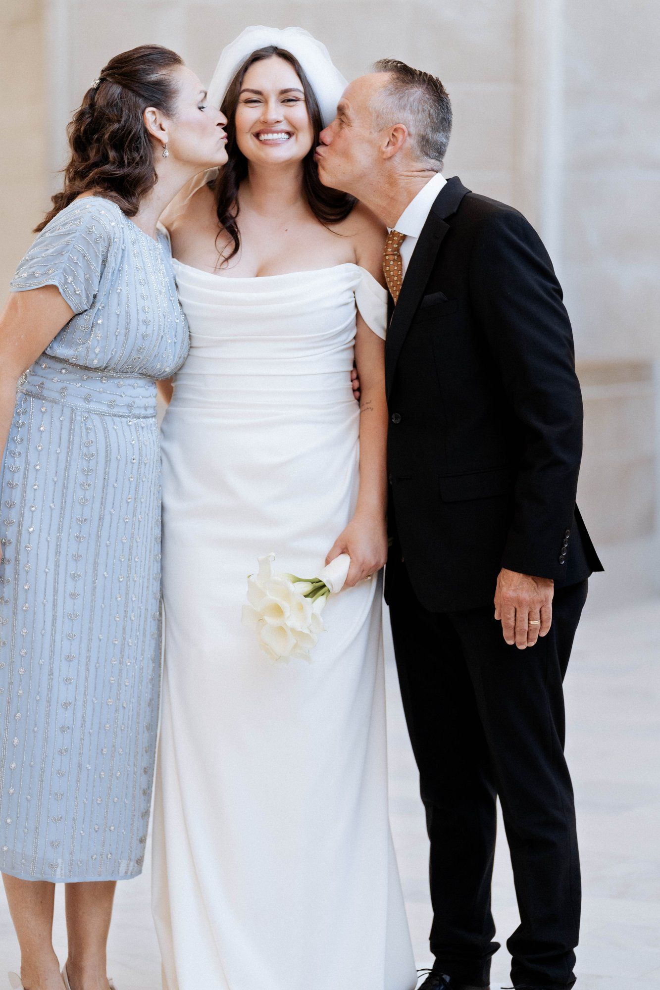 multicultural city hall elopement, Portraits Through the Multicultural City Hall Landmark