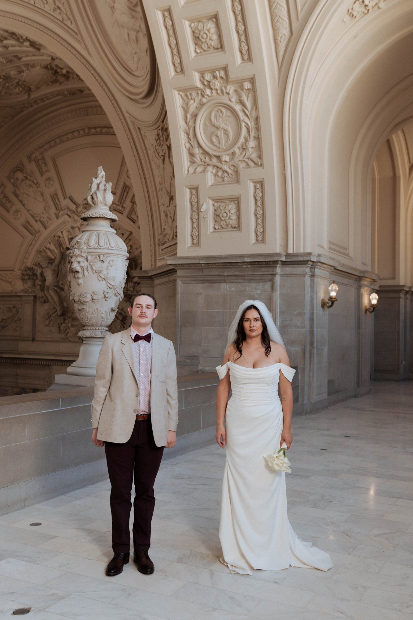 multicultural city hall elopement, Portraits Through the Multicultural City Hall Landmark