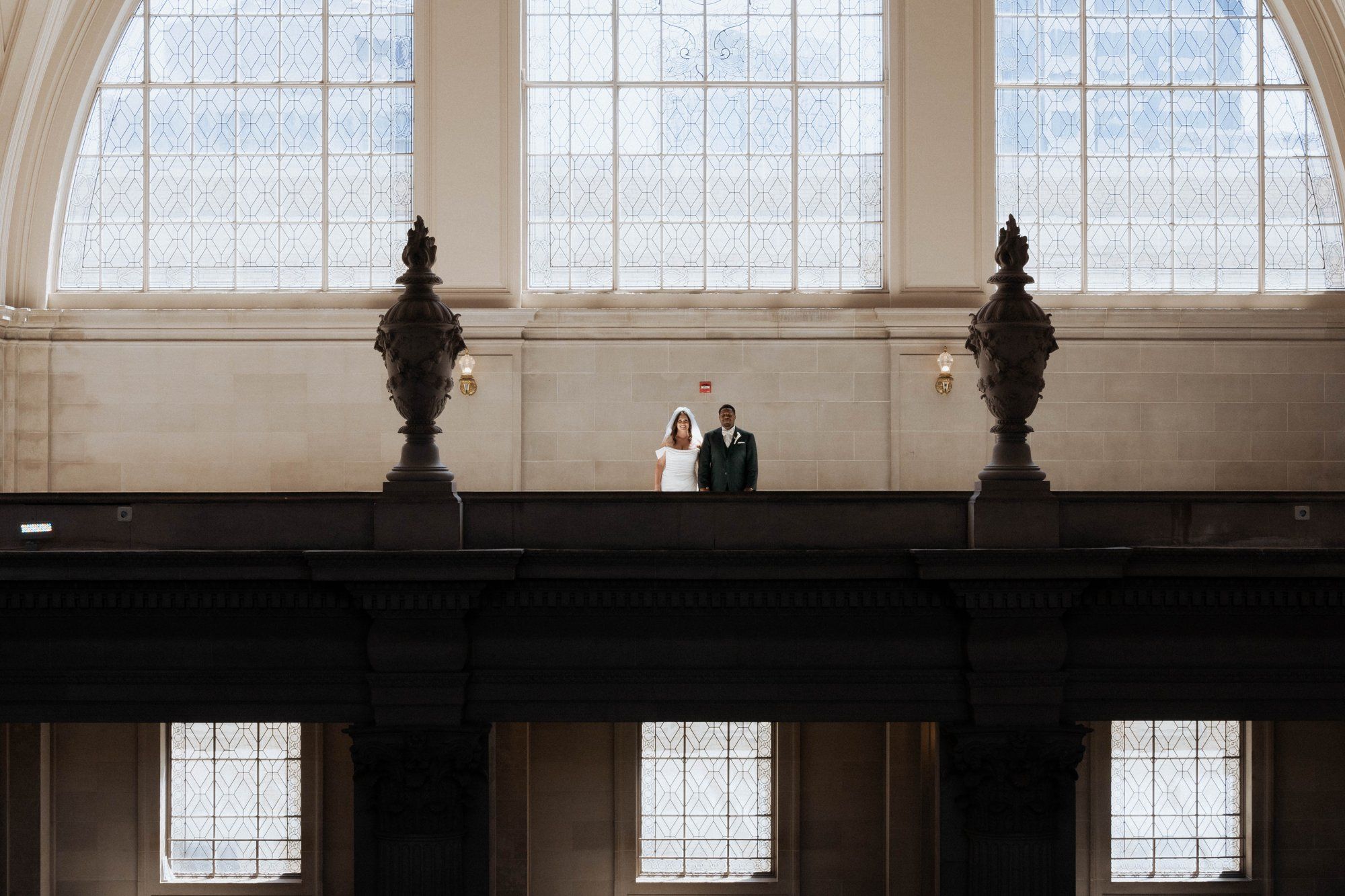 multicultural city hall elopement, Portraits Through the Multicultural City Hall Landmark