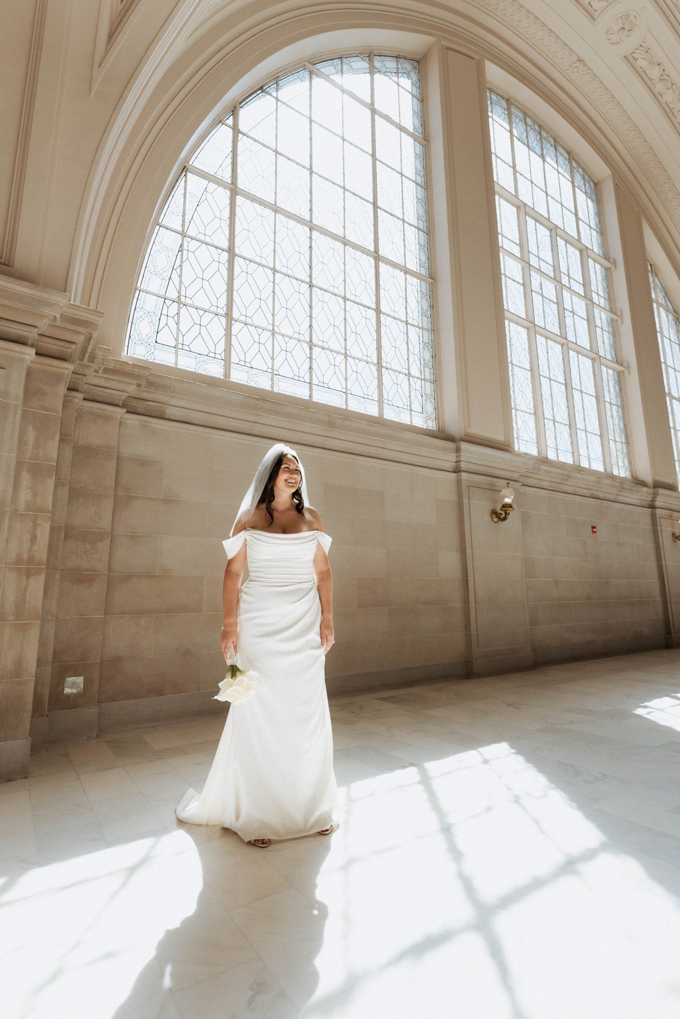 multicultural city hall elopement, Portraits Through the Multicultural City Hall Landmark