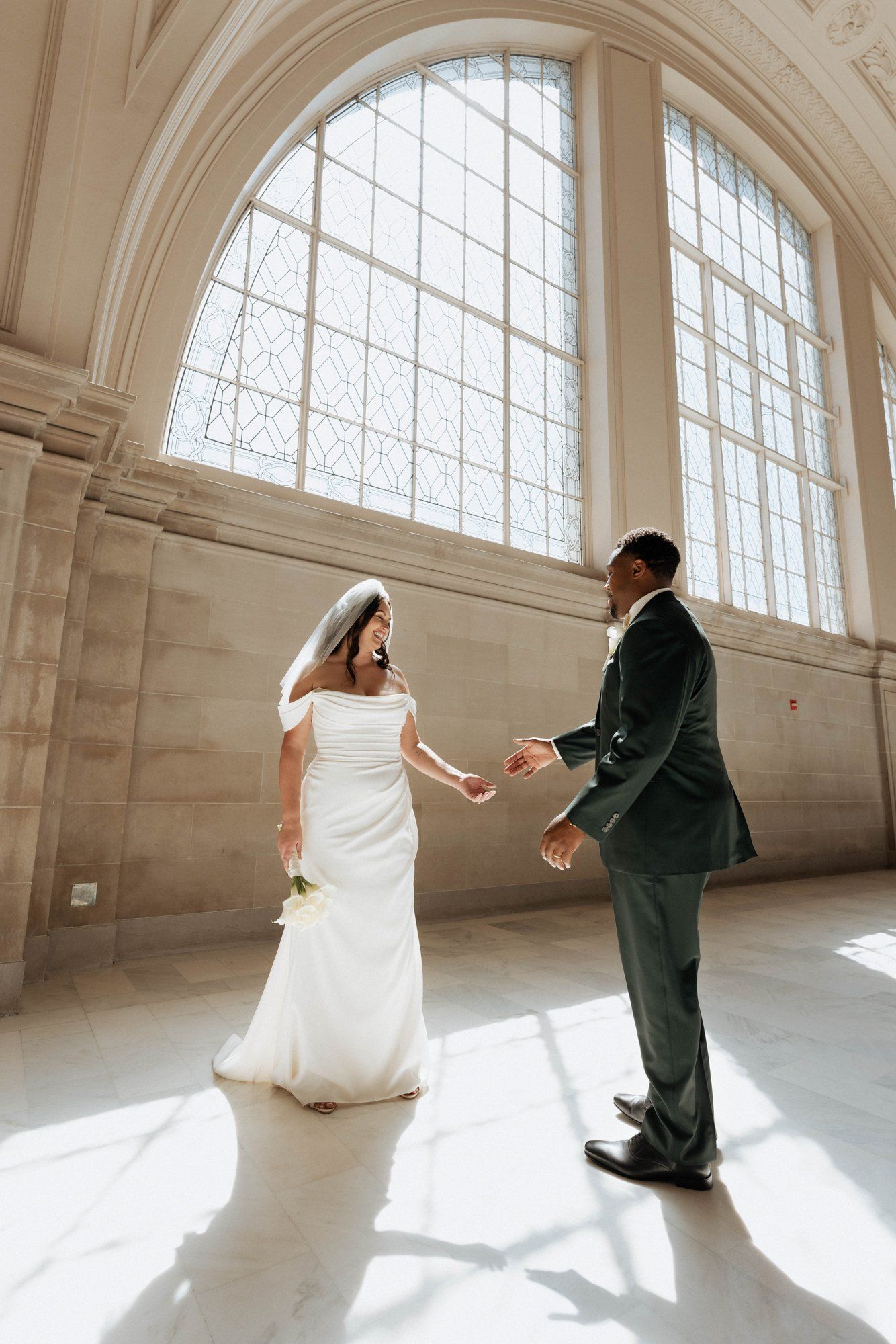 multicultural city hall elopement, Portraits Through the Multicultural City Hall Landmark