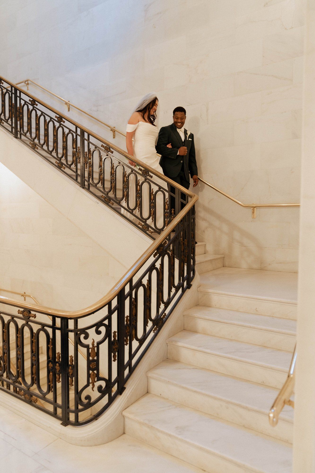 multicultural city hall elopement, Portraits Through the Multicultural City Hall Landmark
