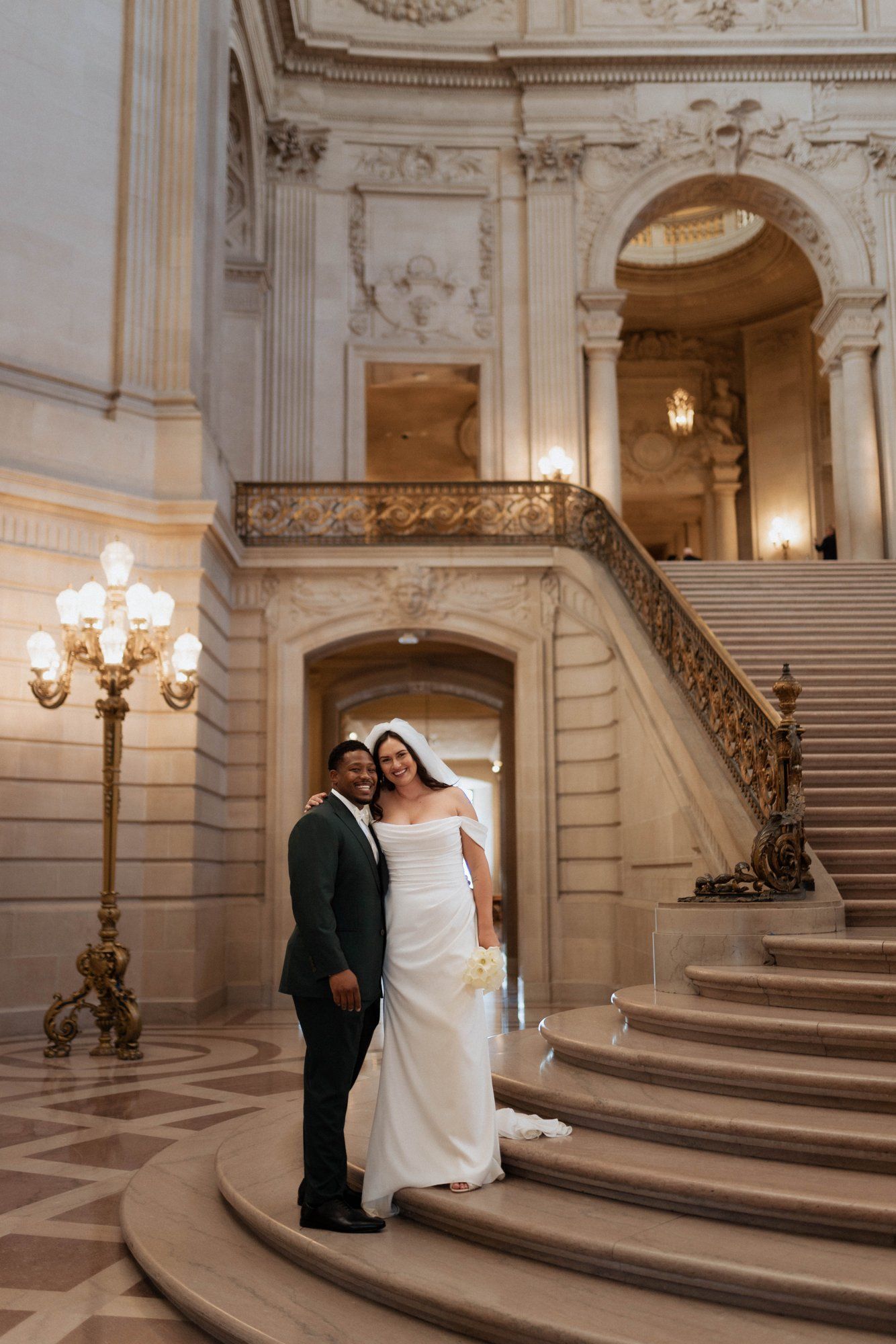 multicultural city hall elopement, Portraits Through the Multicultural City Hall Landmark
