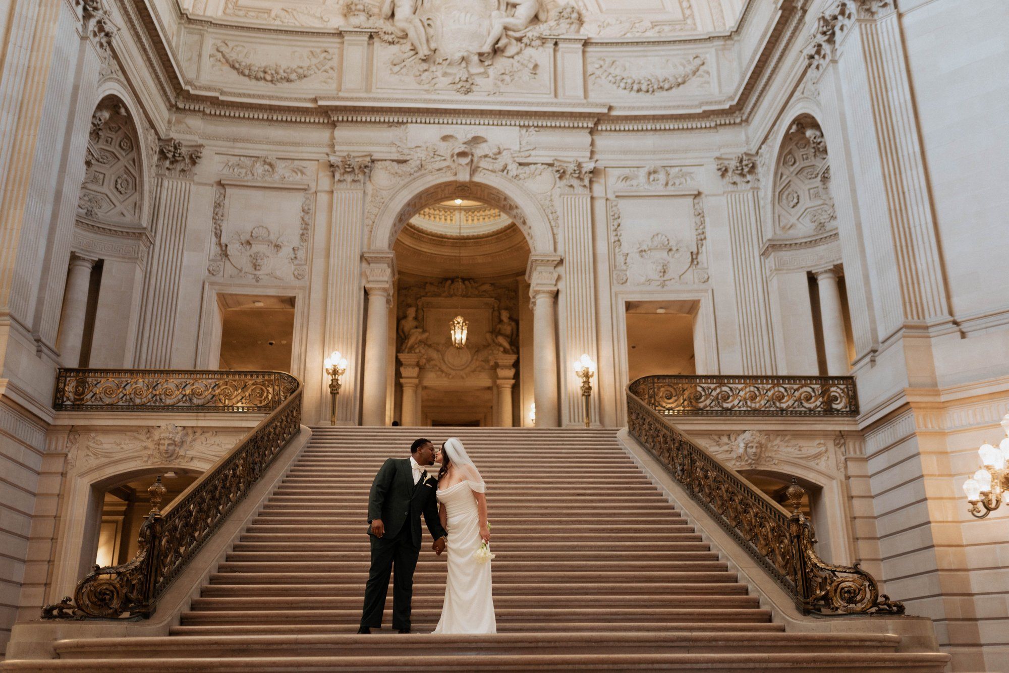 multicultural city hall elopement, Portraits Through the Multicultural City Hall Landmark
