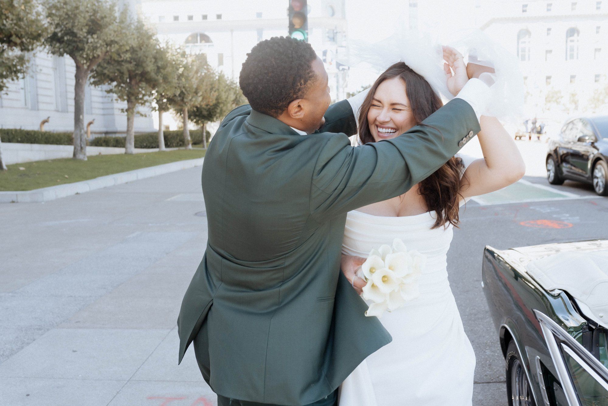 multicultural city hall elopement, Portraits Through the Multicultural City Hall Landmark