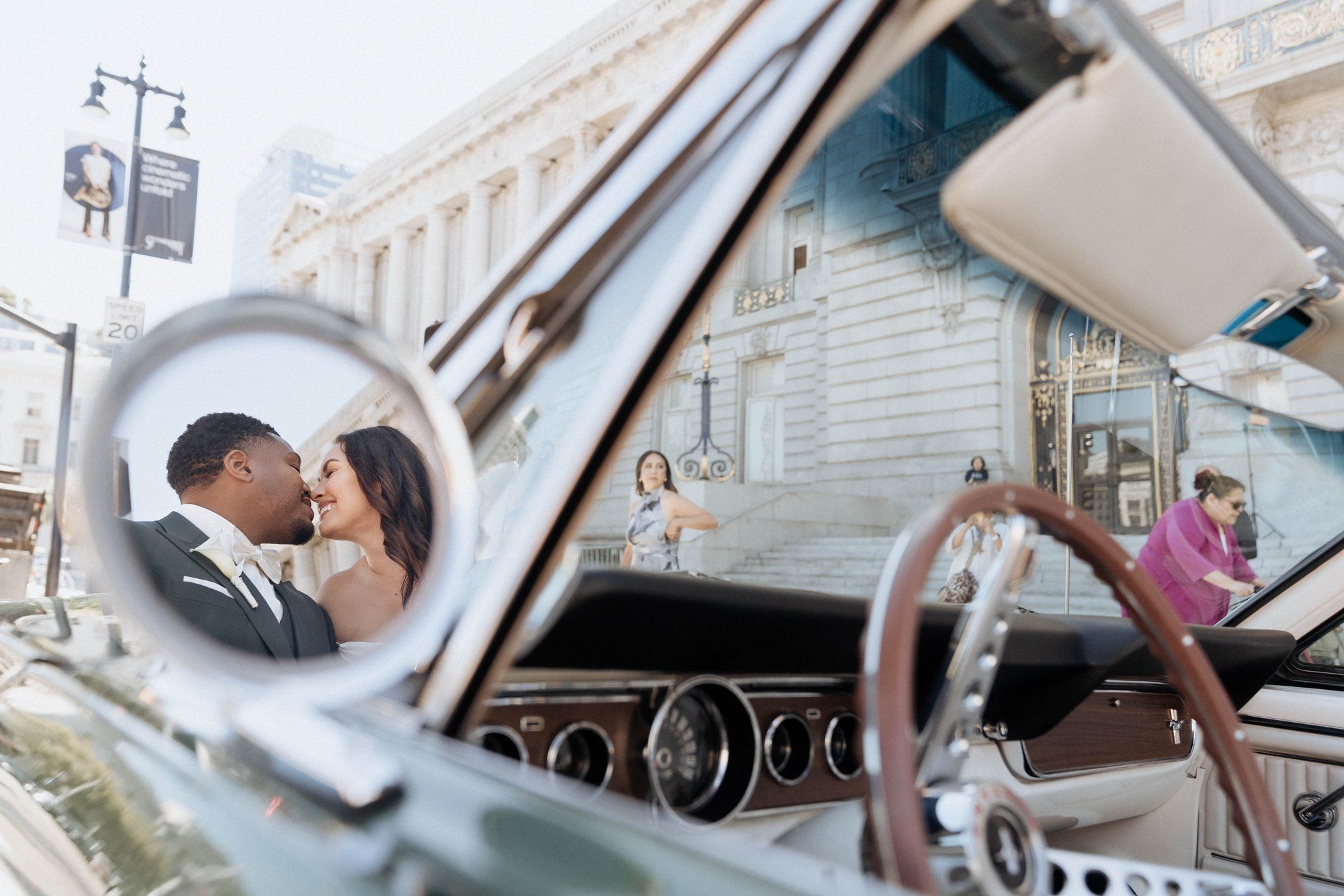 multicultural city hall elopement, Portraits Through the Multicultural City Hall Landmark