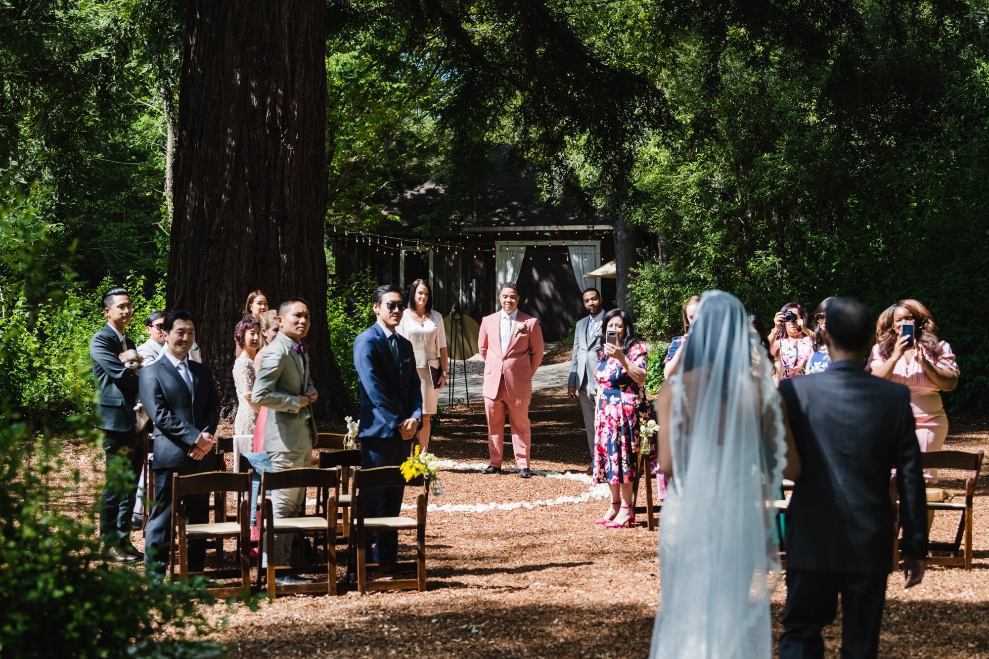A multicultural spring wedding at Sand Rock Farm, Vows in the Redwood Grove at Sand Rock Farm