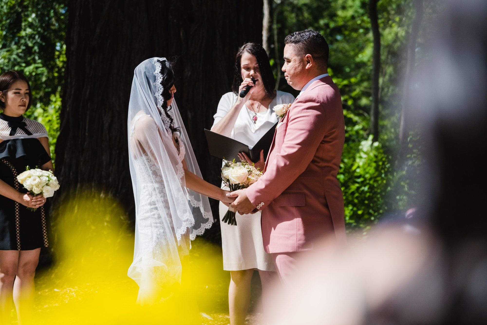 A multicultural spring wedding at Sand Rock Farm, Vows in the Redwood Grove at Sand Rock Farm