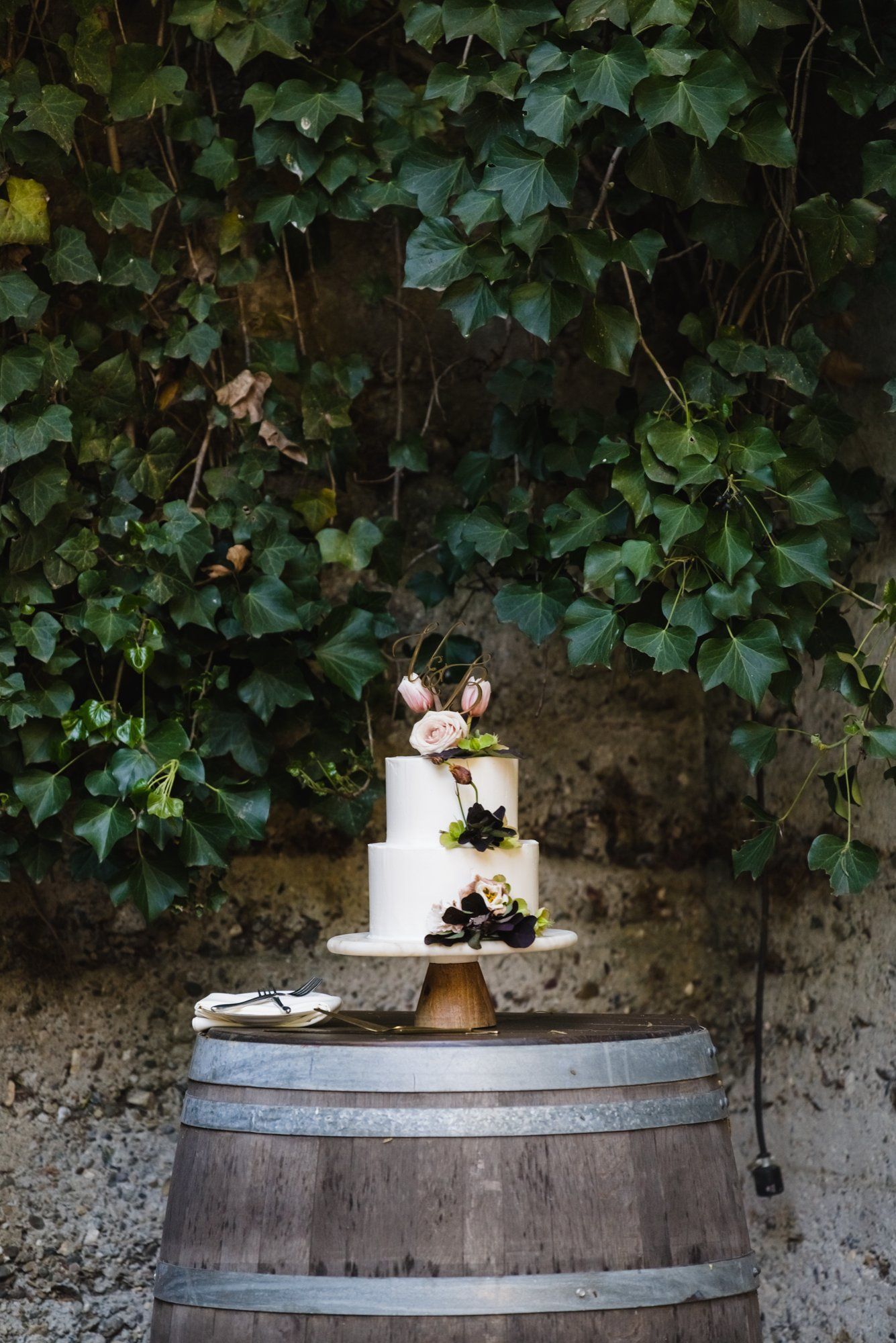 multicultural spring wedding at sand rock farm, A Family-Style Spring Dinner in the Barrel Room