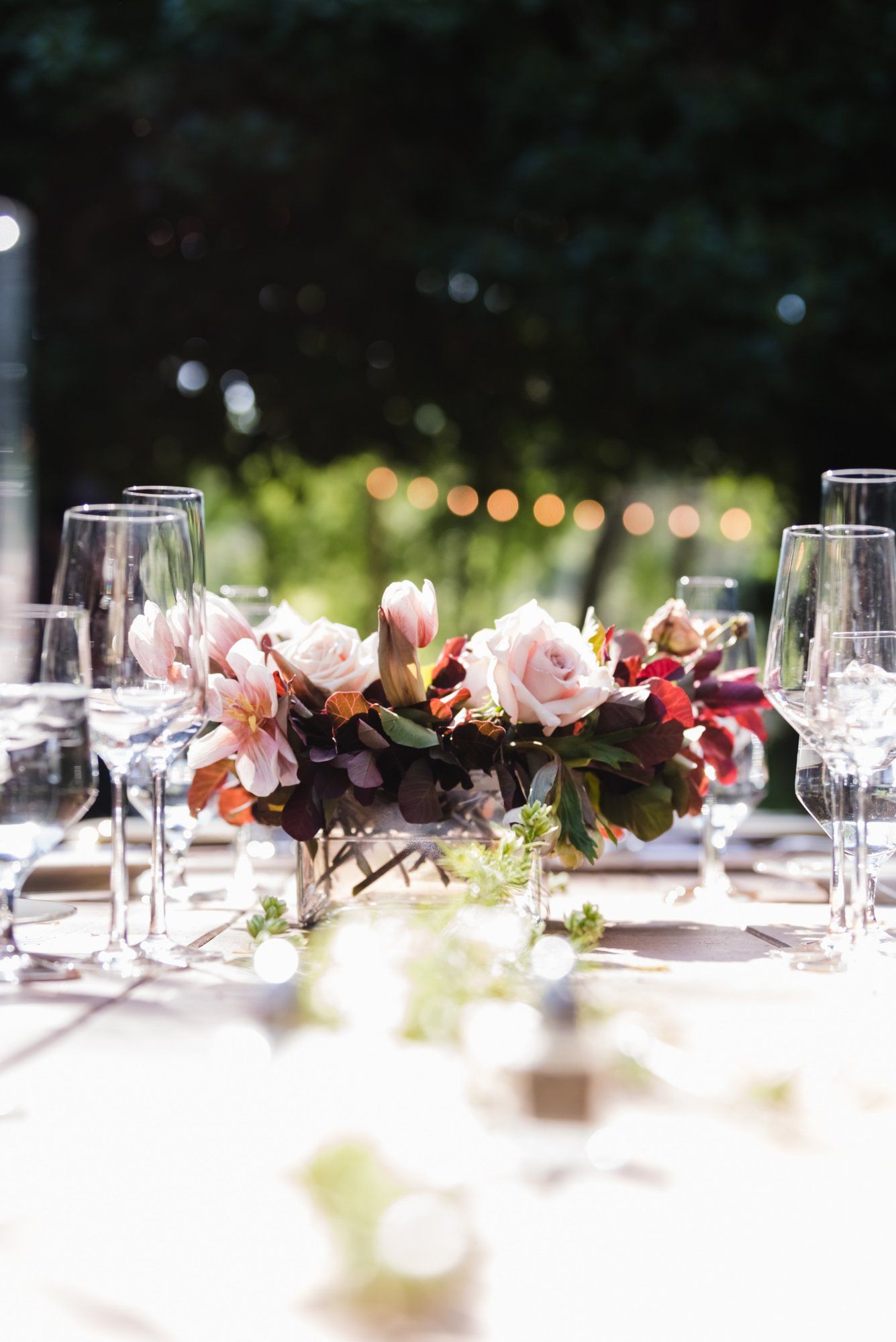 multicultural spring wedding at sand rock farm, A Family-Style Spring Dinner in the Barrel Room