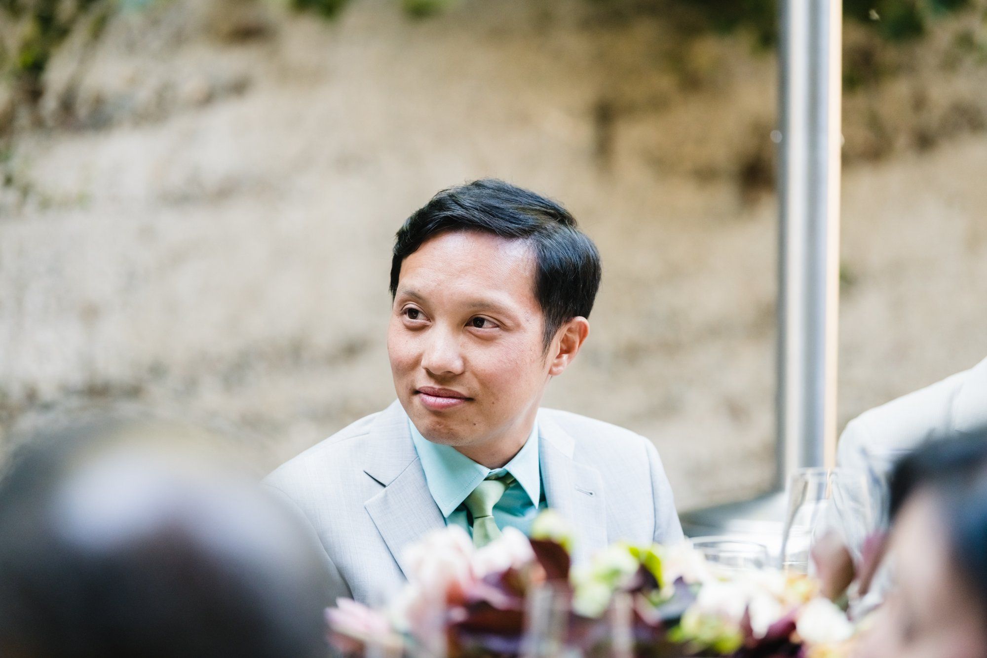 multicultural spring wedding at sand rock farm, A Family-Style Spring Dinner in the Barrel Room