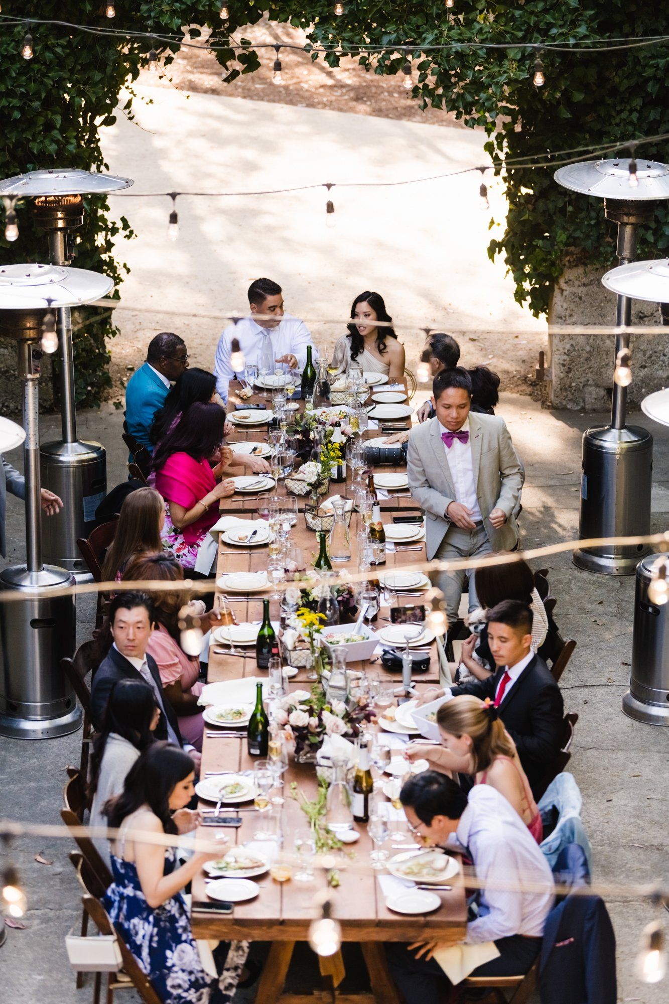 multicultural spring wedding at sand rock farm, A Family-Style Spring Dinner in the Barrel Room