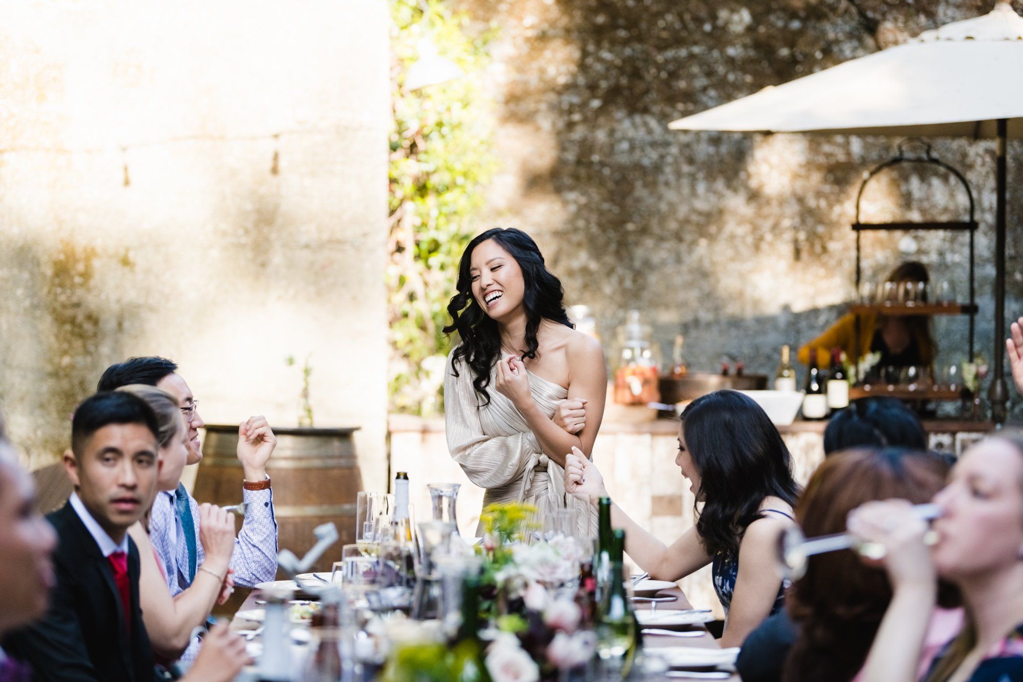multicultural spring wedding at sand rock farm, A Family-Style Spring Dinner in the Barrel Room