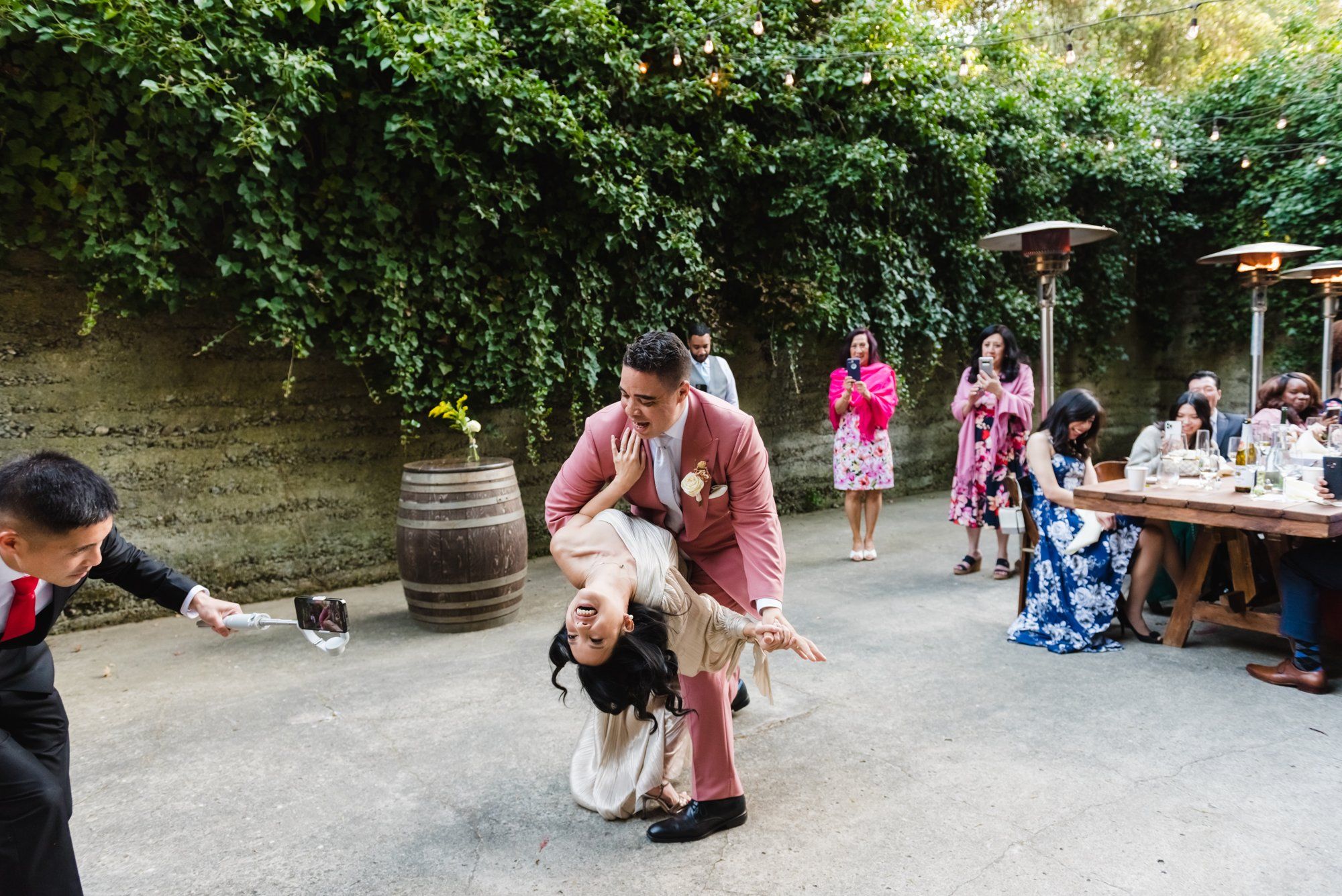 multicultural spring wedding at sand rock farm, A Family-Style Spring Dinner in the Barrel Room