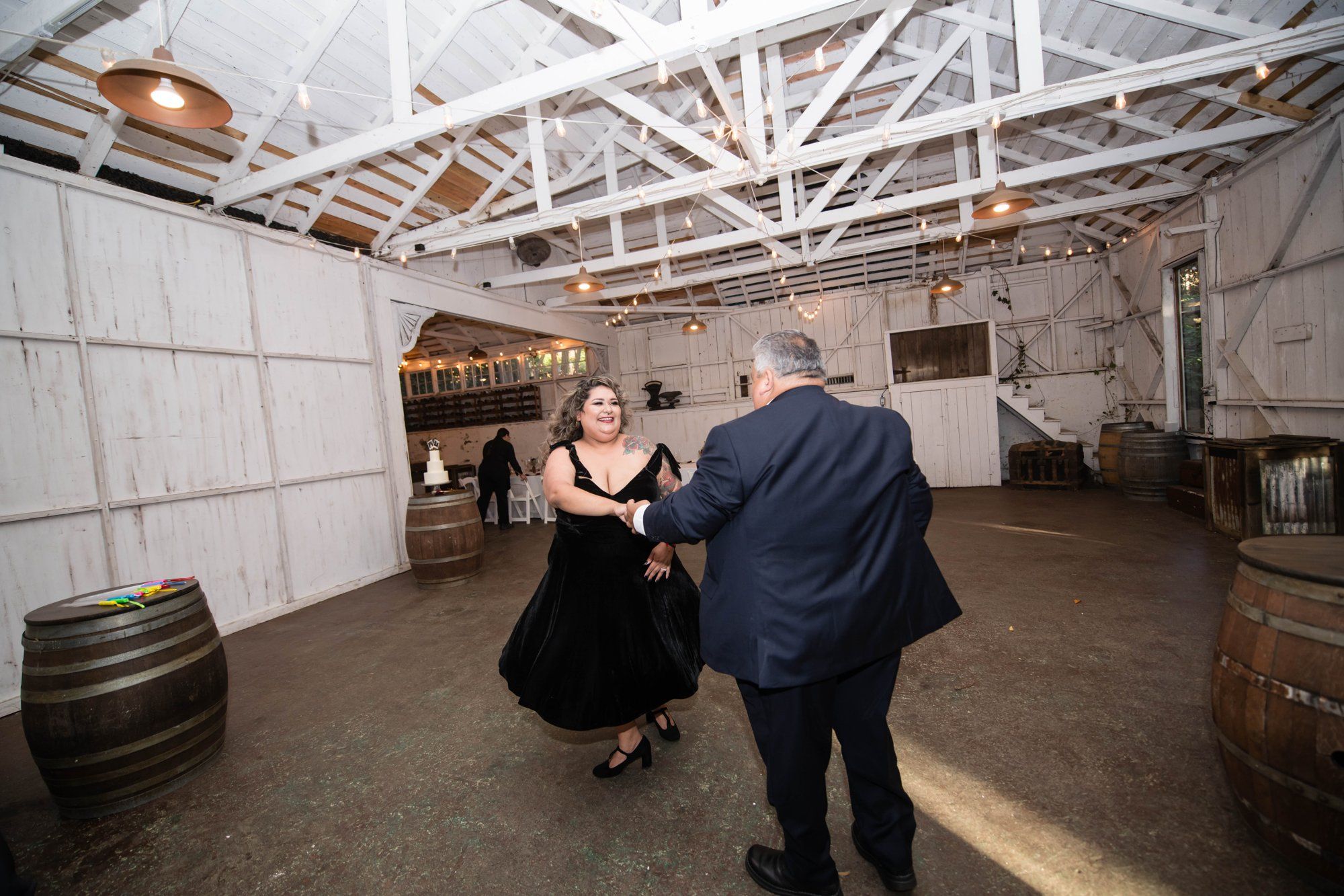 A fall-foliage micro wedding at Sand Rock Farm, Toasts, Cake & Dancing Under the Café Lights