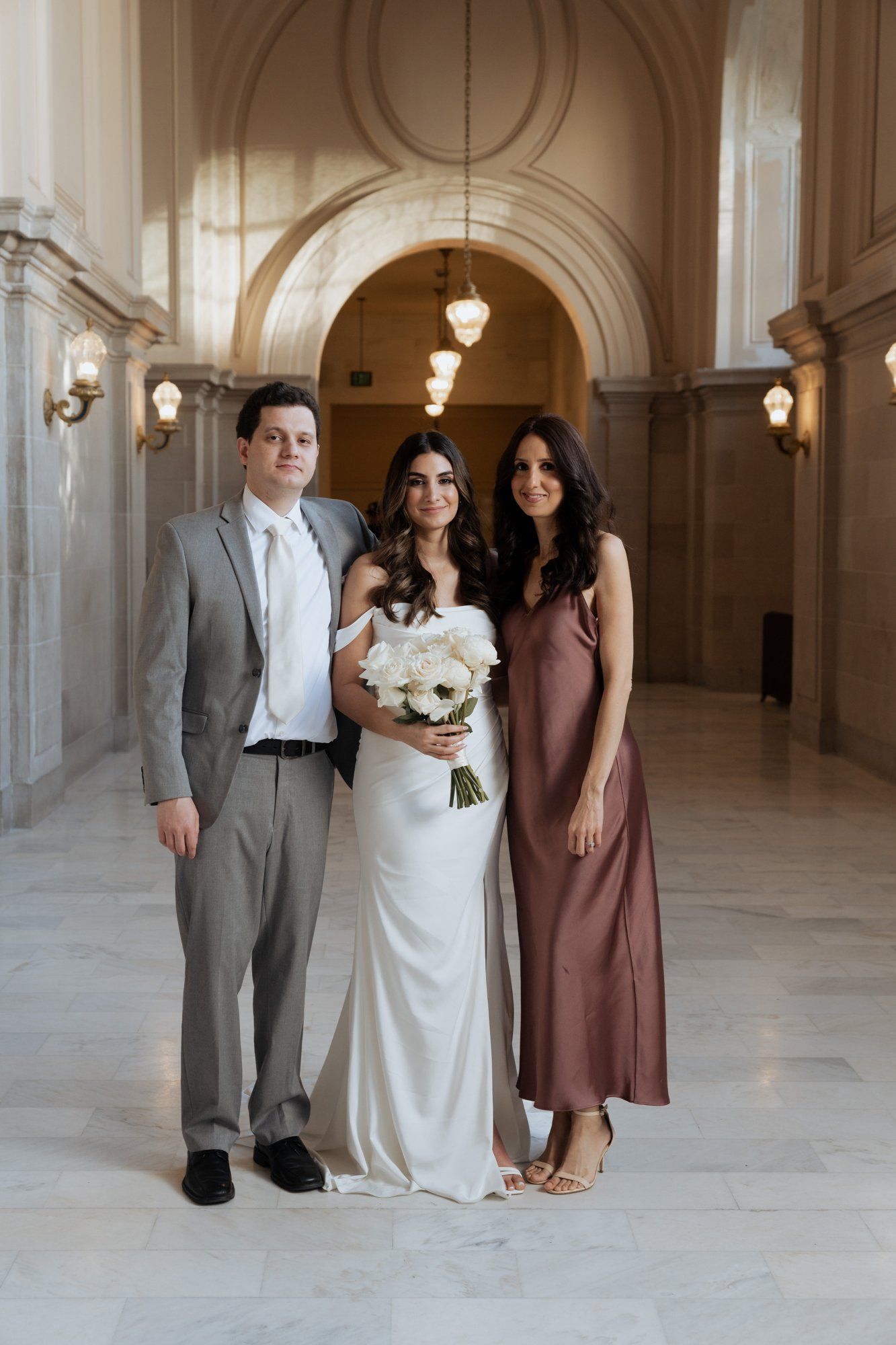 three-location city hall day: mayor's balcony + palace of fine arts + vault garden, Under the City Hall Dome, Then Three-Location Portraits at Palace of Fine Arts